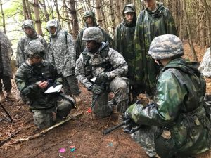 Junior ROTC Cadet delivers a brief prior to executing a mission
