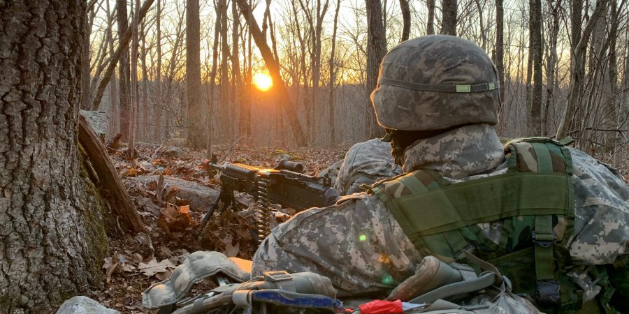 Cadet occupies a security position with an M240B during JFTX 2021