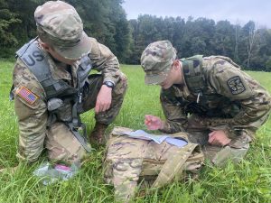 Cadets work together to plot points during land navigation lab